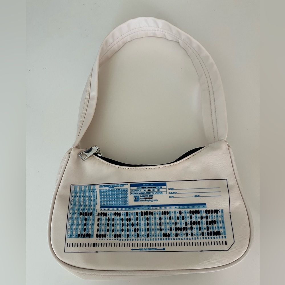 PRAYING handbag “I don’t care”